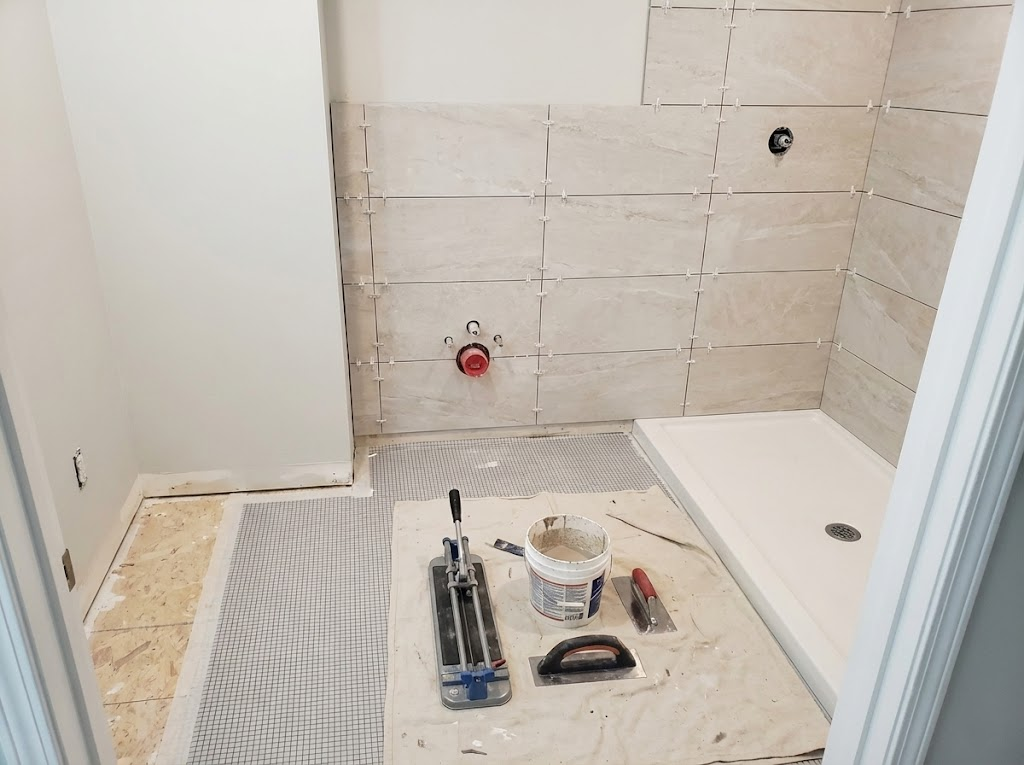 Professional kitchen backsplash tile installation and design with custom hardwood flooring in San Diego