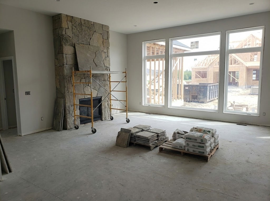 Remodeled luxury bathroom custom tile flooring and walls with walk in shower tile.