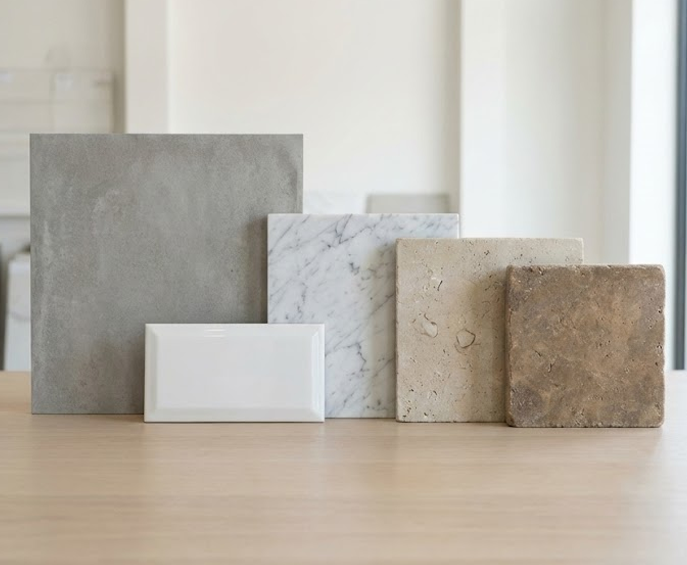 Remodeled luxury bathroom custom tile flooring and walls with walk in shower tile.